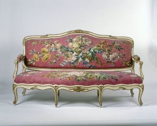 Sofa upholstered in tapestry with floral bouquets