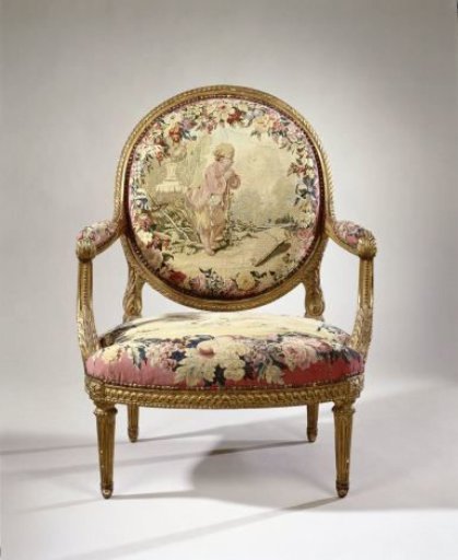 Armchair upholstered with tapestry featuring a boy in a vineyard (petit vendangeur) (back) and a flying eagle with a partridge in its claws (seat)