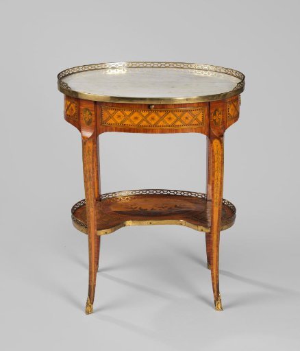 Table, oval, with top of white marble. Stretched S-shaped legs. Decorated with marquetry featuring floral and leaf motifs