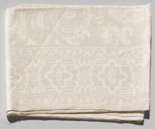 Tablecloth with ornamental volutes intersected by acanthus volutes