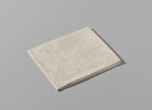 Fragment of a tablecloth decorated with volute scrolls