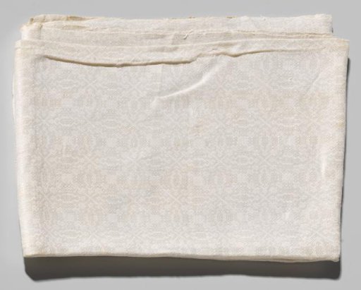 Napkin with a cross-stitch pattern
