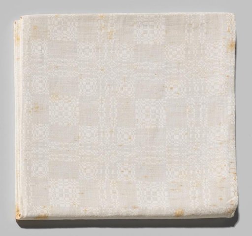 Serviet or napkin with a diaper pattern