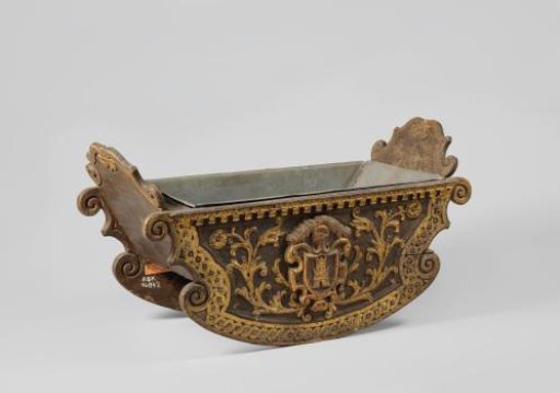Rocking cradle of gilded painted walnut