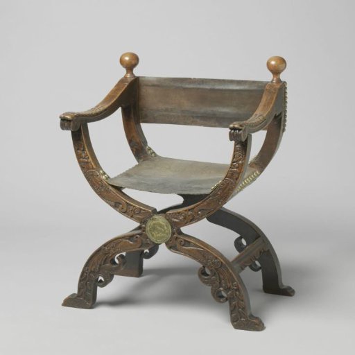 Folding chair of nutwood, upholstered with leather on the back and seat
