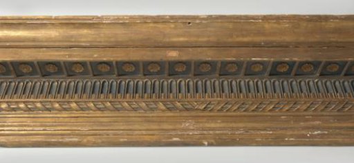 Part of a window frame. Profiled cornice of gilded wood.