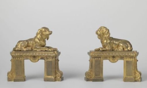 Fire dog of gilded bronze with a lying dog