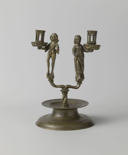 Two-armed candelabrum with a male and a female figure