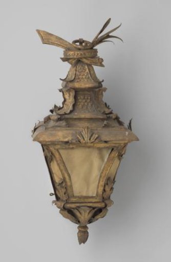 Lantern, four-sided with truncated corners and articulated roof, crowned by a flat ring containing ears of grain