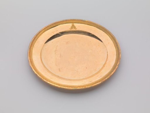 Plate of Gilded Silver, with Palmette Border. On the Surface the Engraved Coat of Arms of Potemkin.