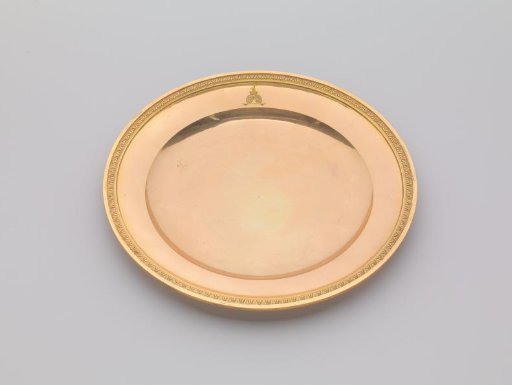 Plate of Gilded Silver, with Palmette Border. On the Surface the Engraved Coat of Arms of Potemkin.