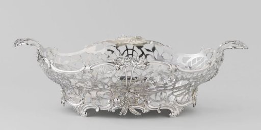 Bread basket, the wall pierced with floral and leafy vines, fruit and ears of corn