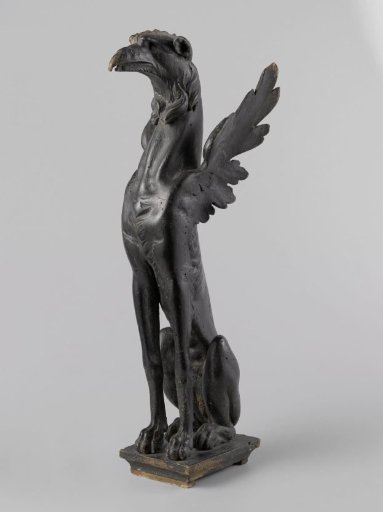 Griffin with its velvet pedestal