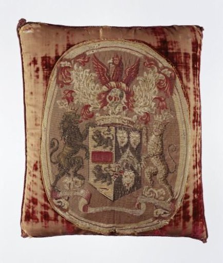 Textile fragment with the coat of arms of Masham, attached to a cushion