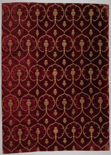 Velvet brocade with pomegranate pattern in gold on wine-red