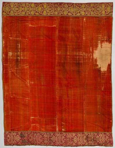 Silk damask in crimson, appliquéd with a wreath