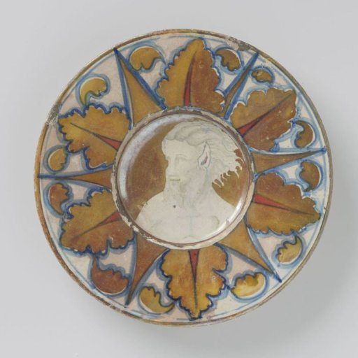 Panel with a sunken flat surface, multicolored painted with a satyr with pointed ears and a beard