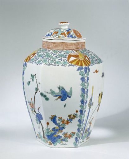 Two vases with lids