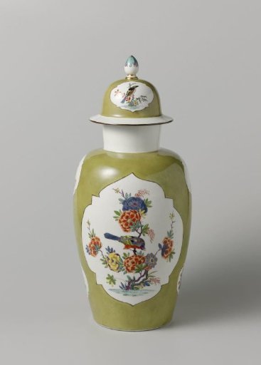 Vase with lid, multicolored painted with Indian flowers in cut-out quatrefoils on a moss-green ground