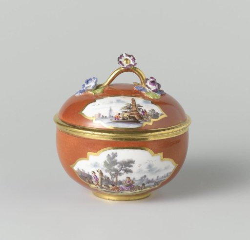 Sugar pot with lid, multicolored painted with water landscapes in cut-out quatrefoils on an orange-red ground