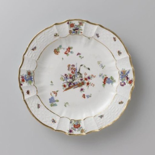 Round plate, multicolored painted with a Kakiemon decoration