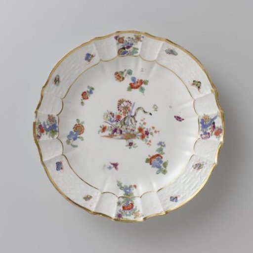 Round plate, multicolored painted with a Kakiemon decoration