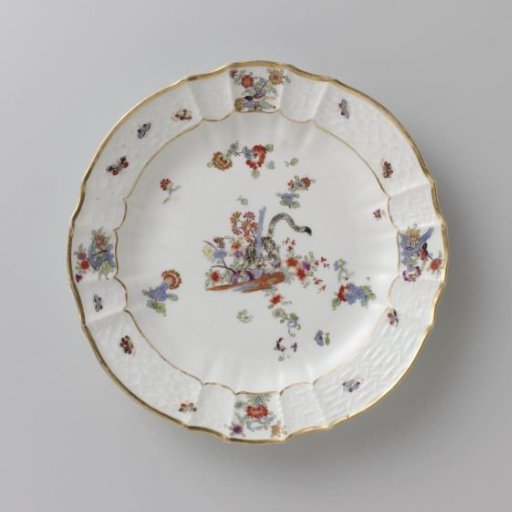 Round plate, multicolored painted with a Kakiemon decoration