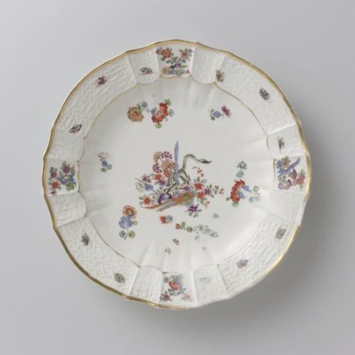 Round plate, multicolored painted with a Kakiemon decoration