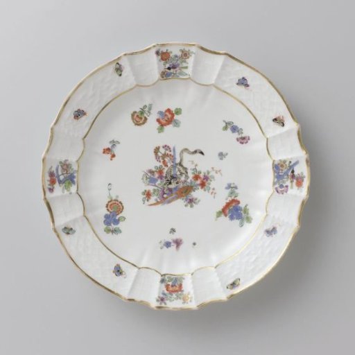 Round plate, multicolored painted with a Kakiemon decoration