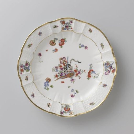 Round plate, multicolored painted with a Kakiemon decoration