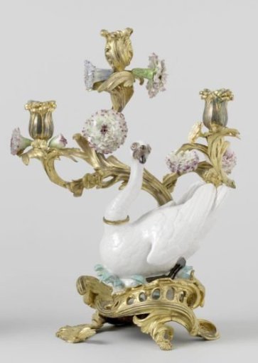 Swan of multicolored painted porcelain, in a bronze mount