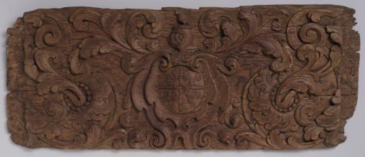 Panel of wood with a central cartouche containing a coat of arms