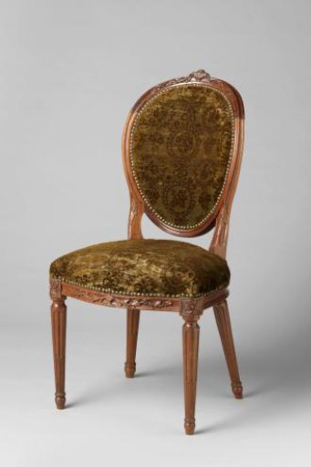 Mahogany armchair upholstered in green silk