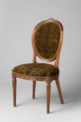 Mahogany armchair upholstered in green silk