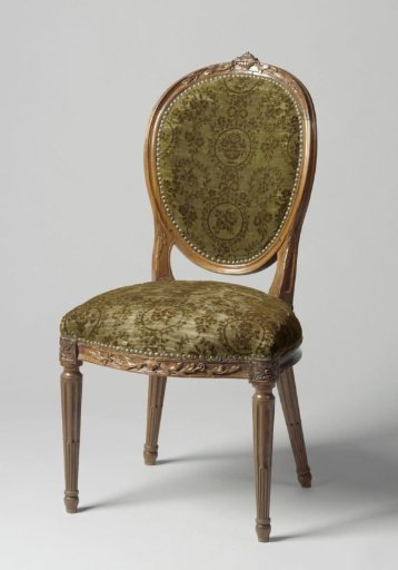 Chair of mahogany, upholstered in green morocco leather