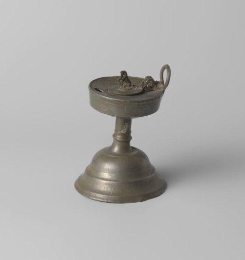 Tin oil lamp with a seated horse as the lid knob