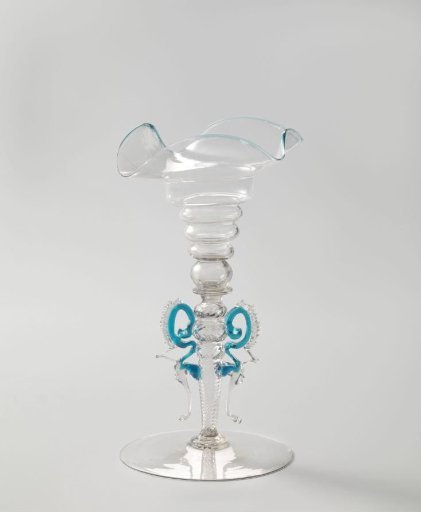 Winged glass with a funnel-shaped, five-folded stem and a four-lobed rim