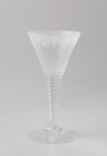Chalice glass with an ornamental border