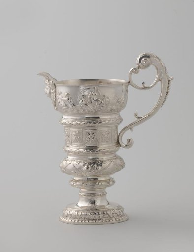 Silver ewer decorated with flower clusters and pearl borders