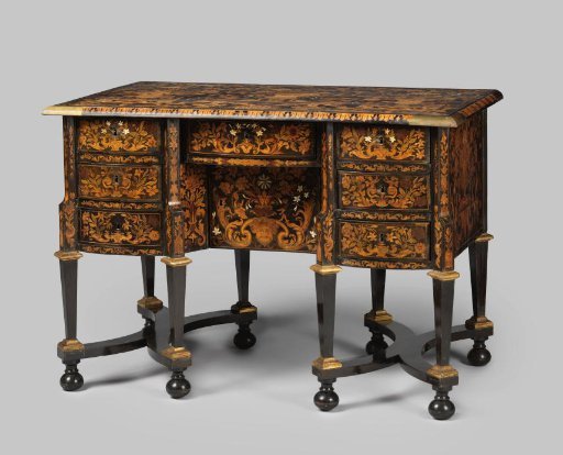 Desk decorated with marquetry of various wood types