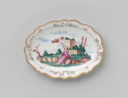 Oval saucer with depiction of a seated woman