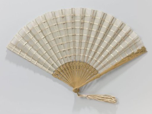 Folding fan with leaf of batiste decorated with narrow ribbons, on a carved, gilded and lacquered wooden frame