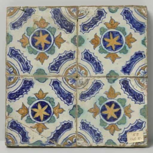 Panel of four tiles with stars and leaves