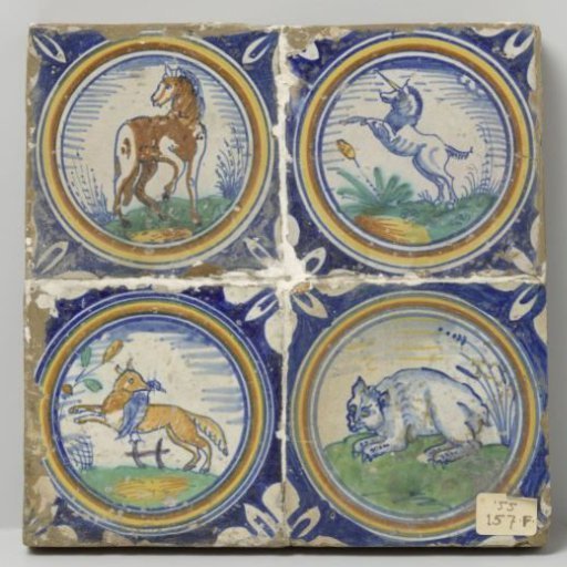Panel of four tiles with animals