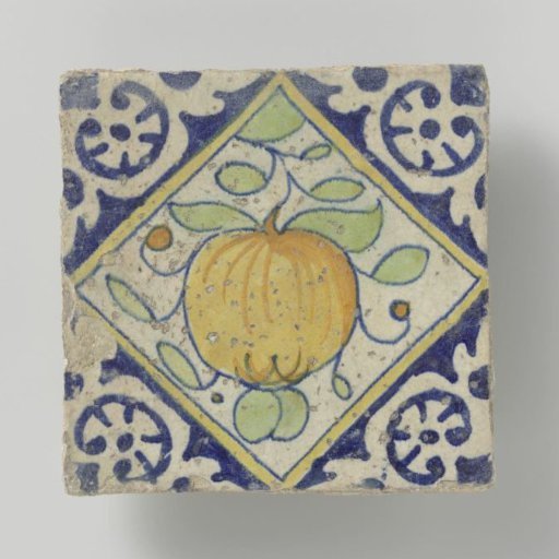 Tile with a pomegranate