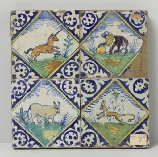 Panel of four tiles with animals