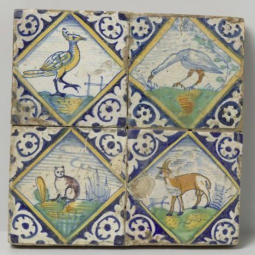 Panel of four tiles with animals