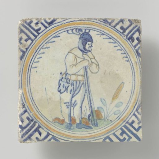 Tile with a standing figure