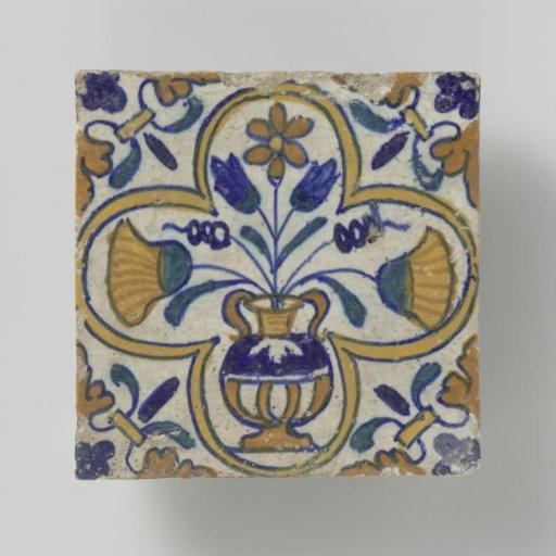 Pompadour tile with a flowerpot in a quatrefoil