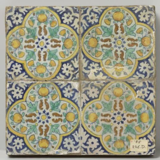Panel of four pompadour tiles with rosettes and pomegranates